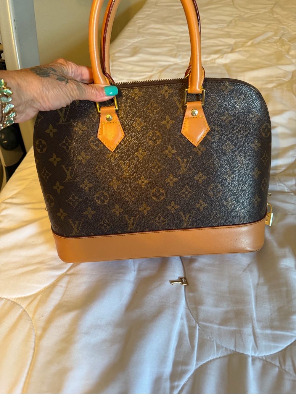 Louis Vuitton Monogram Canvas Brown and Tan Alma PM Shoulder Bag